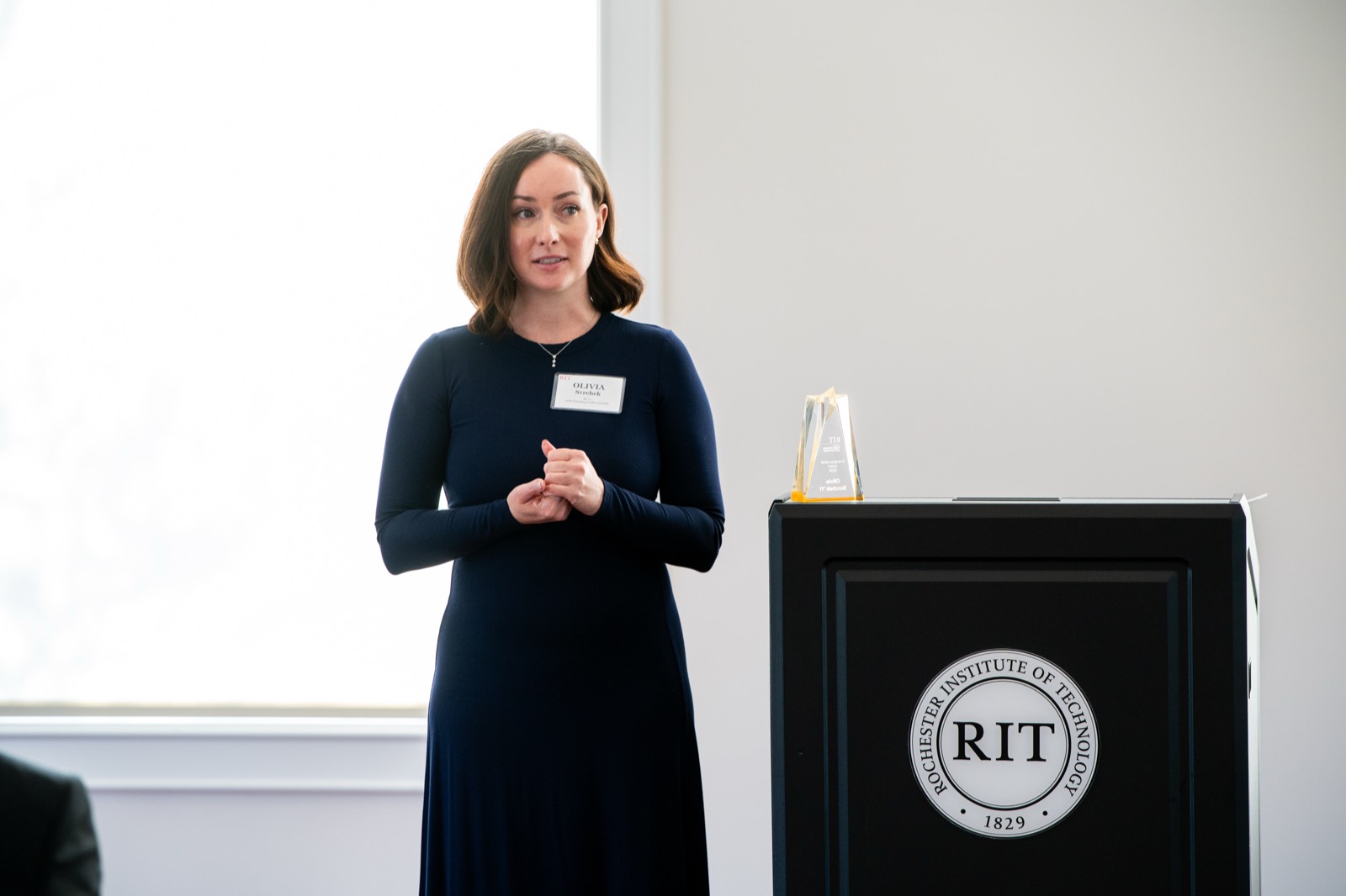 Olivia Svrchek speaking at the RIT Emerging Leader Award ceremony